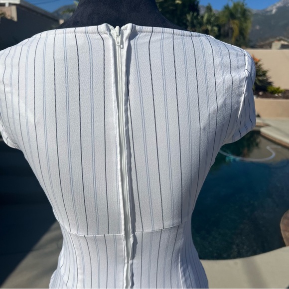 B. Darlin
Pinstripe Square Neck Mini Dress Tie Back Empire Waist
Size 3/4 - Picture 12 of 15